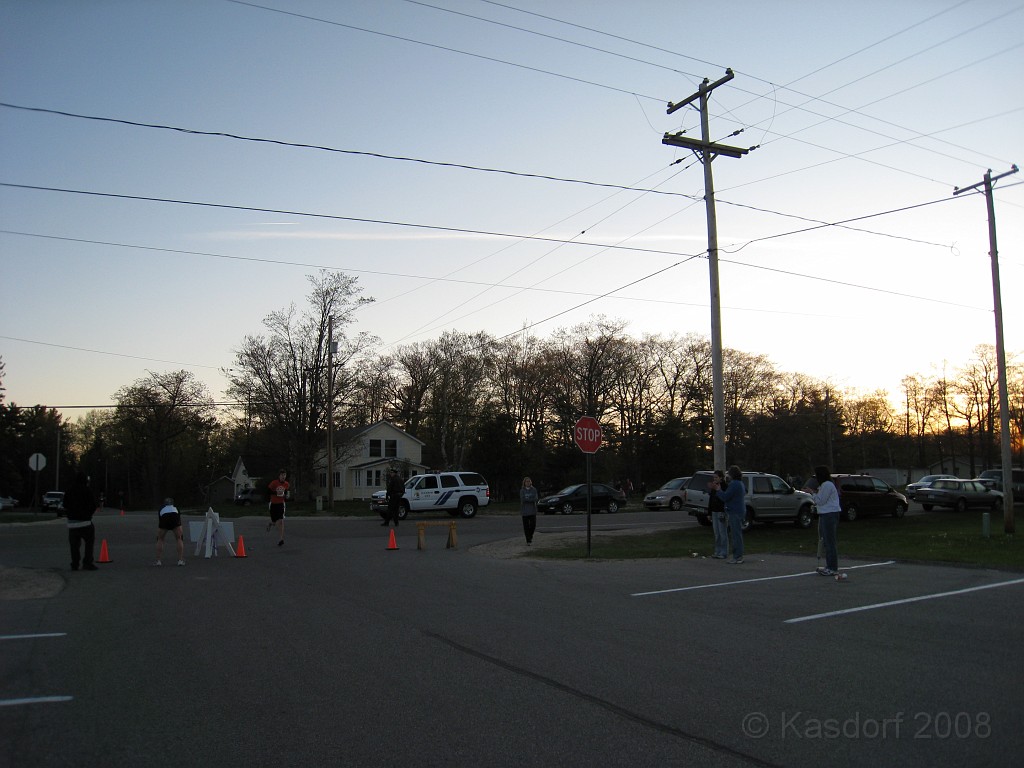 Mackinaw Bridge Race 2008-05 0106.jpg - Approaching the finish line, still dark, and fairly deserted yet. I was in about the fourth group, they said only 66 other people had started before my group, so not a lot of people at the finish yet... including me!